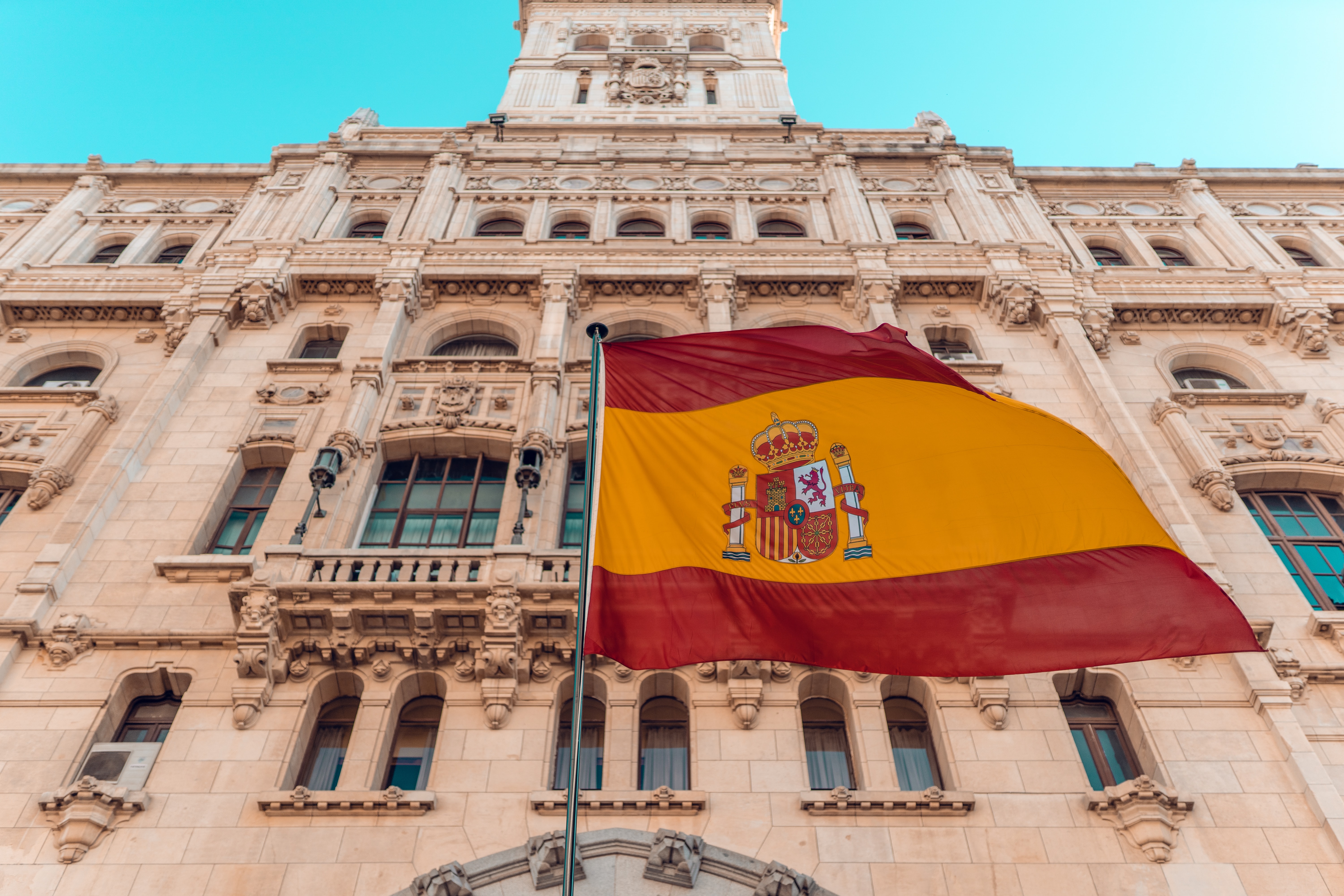 Spanish Flag in front of embassy building